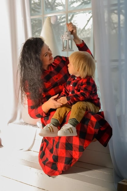 A close-up shot of a mother kneeling between her two children, making direct eye contact with each of them. She's gently holding their hands and actively listening as they explain their sides of a disagreement. The focus is on the empathy and attentiveness she is demonstrating.
