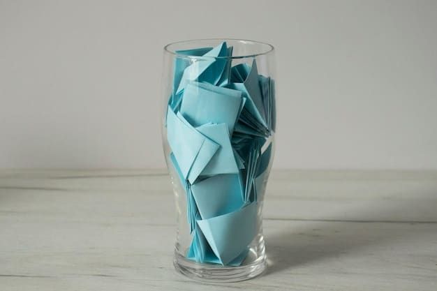 A close-up shot of folded paper slips inside a glass jar. The papers are colorful and have different activities written on them with bright markers. Some example activities visible include 