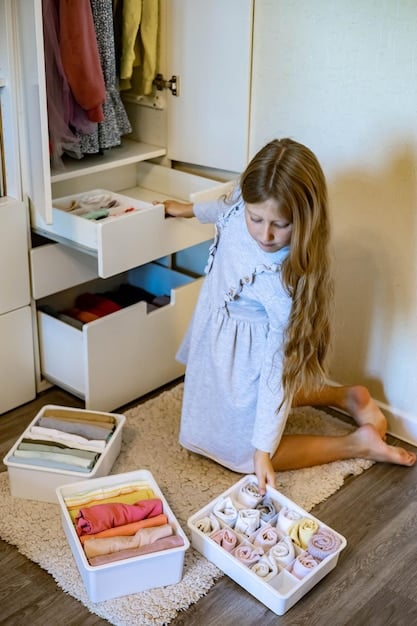 A calm and organized child happily getting dressed from a pre-selected and neatly arranged set of outfits in their closet.