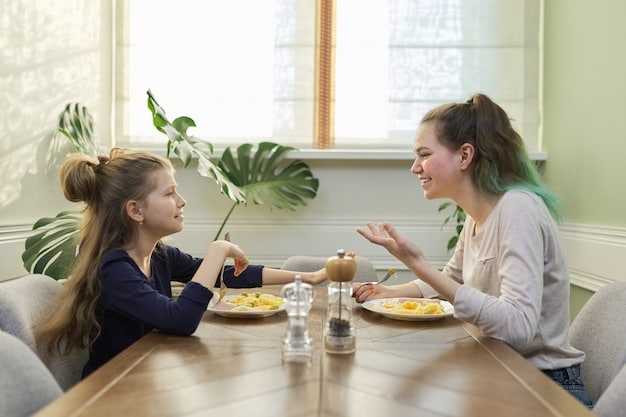 A mother mediating a calm conversation between two siblings sitting at a table, using empathetic listening.