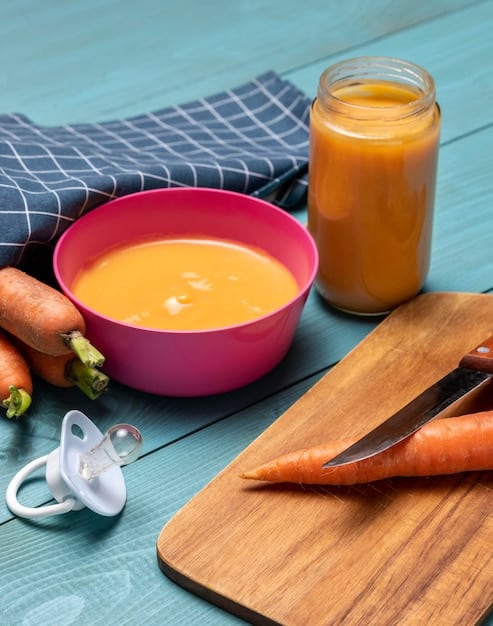 A close-up shot of various colorful, healthy pureed baby foods (e.g., sweet potato, peas, carrots) arranged in small bowls on a wooden table, emphasizing freshness and variety.