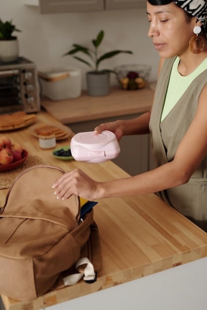An image showing a mother preparing a baby food puree and filling reusable silicone pouches. The picture highlights the benefits of using reusable packaging alternatives to reduce waste.