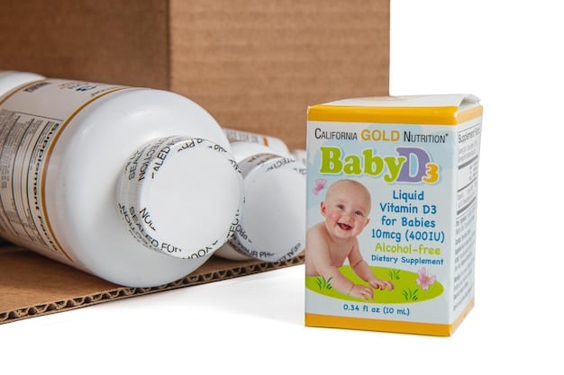 A split image showing two different vitamin D supplement bottles designed for infants, with labels clearly visible. One side emphasizes the 