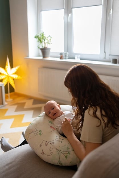 A calm mother gently cradling her newborn in a quiet, softly lit room. The baby is turning its head with its mouth slightly open, indicating a rooting reflex. The mother's expression is attentive and loving.