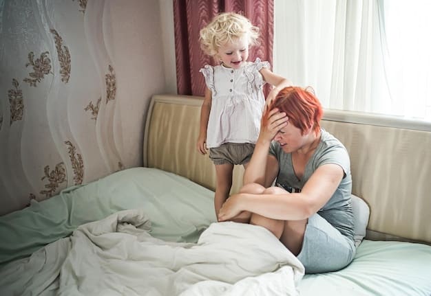 A tired mother sits on the edge of her bed with her head in her hands. Toys are scattered around the room, and a baby is crying in the background. She is wearing pajamas and looks completely overwhelmed. The scene captures the intensity of mom burnout