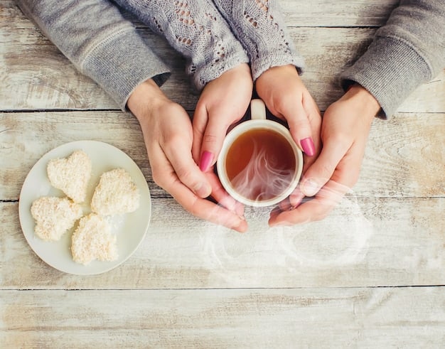 A close-up shot of a mother's hands holding a steaming cup of herbal tea in a cozy, sunlit room. Books are stacked nearby, and a soft blanket is draped over the chair, creating a peaceful and inviting scene promoting relaxation and self-care.