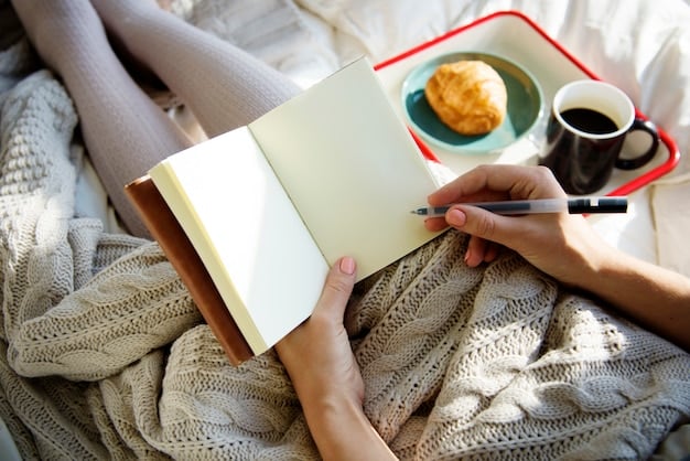 A close-up of a mom's hands holding a gratitude journal, with a pen resting on the page, capturing the act of writing down things she is thankful for.
