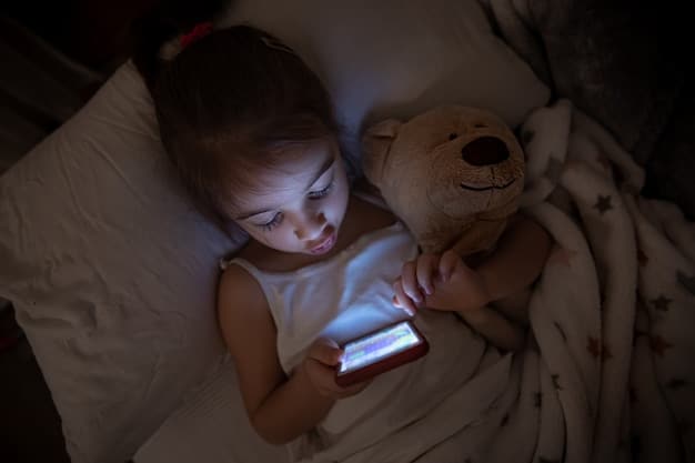 A toddler using a nightlight while peacefully sleeping in their bed. The room is dark, but the gentle glow of the nightlight creates a sense of security and comfort.