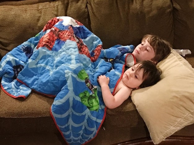 A visualization illustrating how a weighted blanket can help regulate sensory input in children with sensory processing issues, promoting a sense of calm and security.