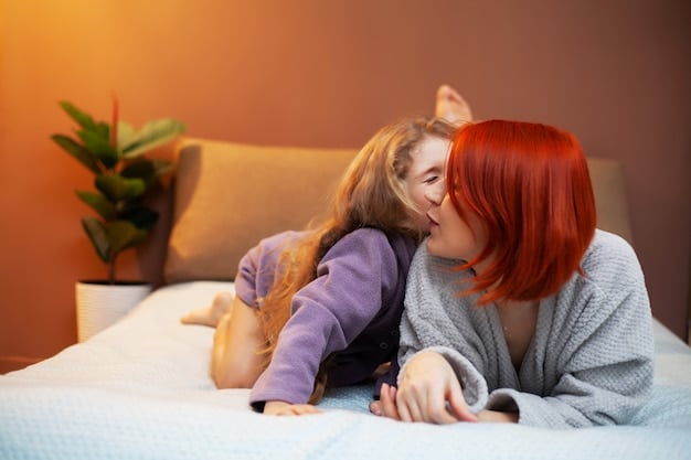 A mother is depicted hugging and smiling at her child in a well-lit bedroom, conveying a sense of connection and happiness after a successful night's sleep.